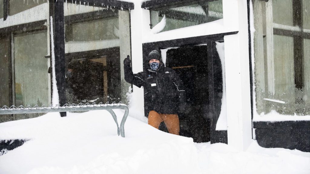 Squaw Valley Employee at Gold Coast checking out the new snow