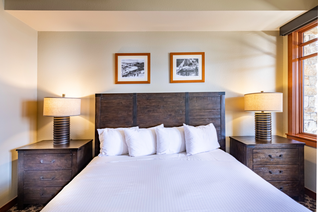Interior of a bedroom in suite at the Village at Palisades Tahoe