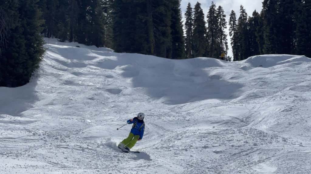 Girl skiing moguls at Palisades Tahoe