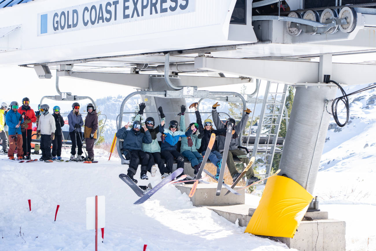 Excited skiers at the top of Gold Coast Express chairlift.