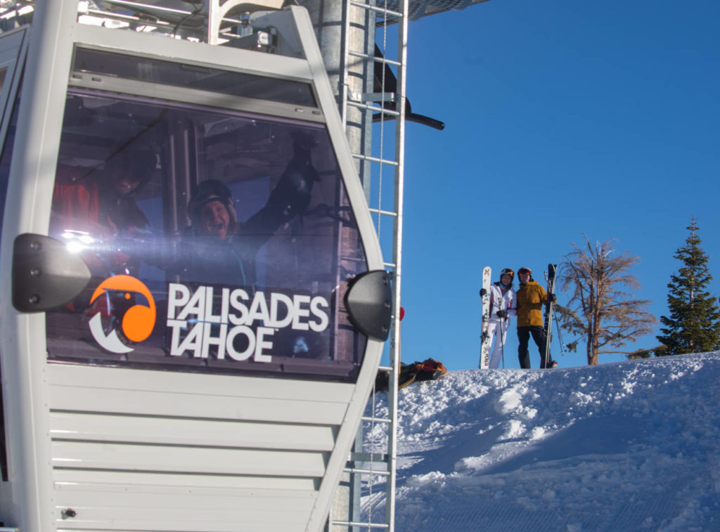 Guests inside and outside the Base to Base Gondola.