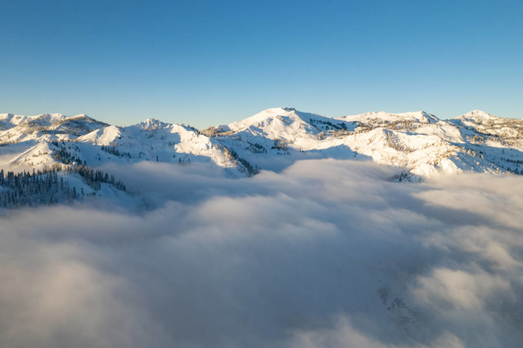 An inversion keeps clouds tucked into Olympic Valley.