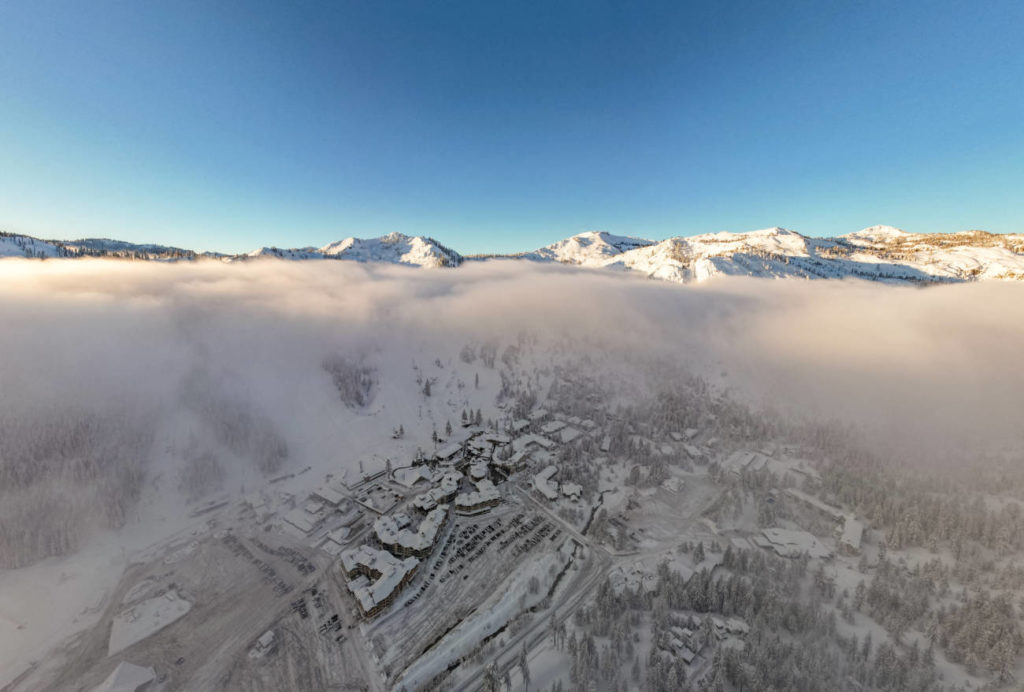The Village at Palisades Tahoe shown from above during an inversion.