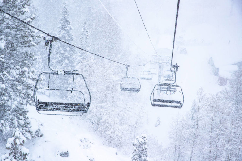 A chairlift during heavy snowfall in Lake Tahoe