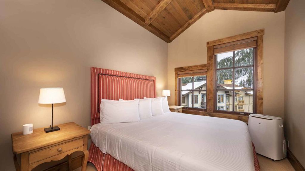 The master bedroom in the Alpine Chateau Suite in The Village at Palisades Tahoe.