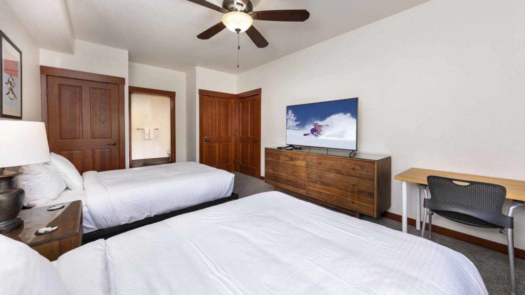 The second bedroom n the Tram Face Suite in The Village at Palisades Tahoe.
