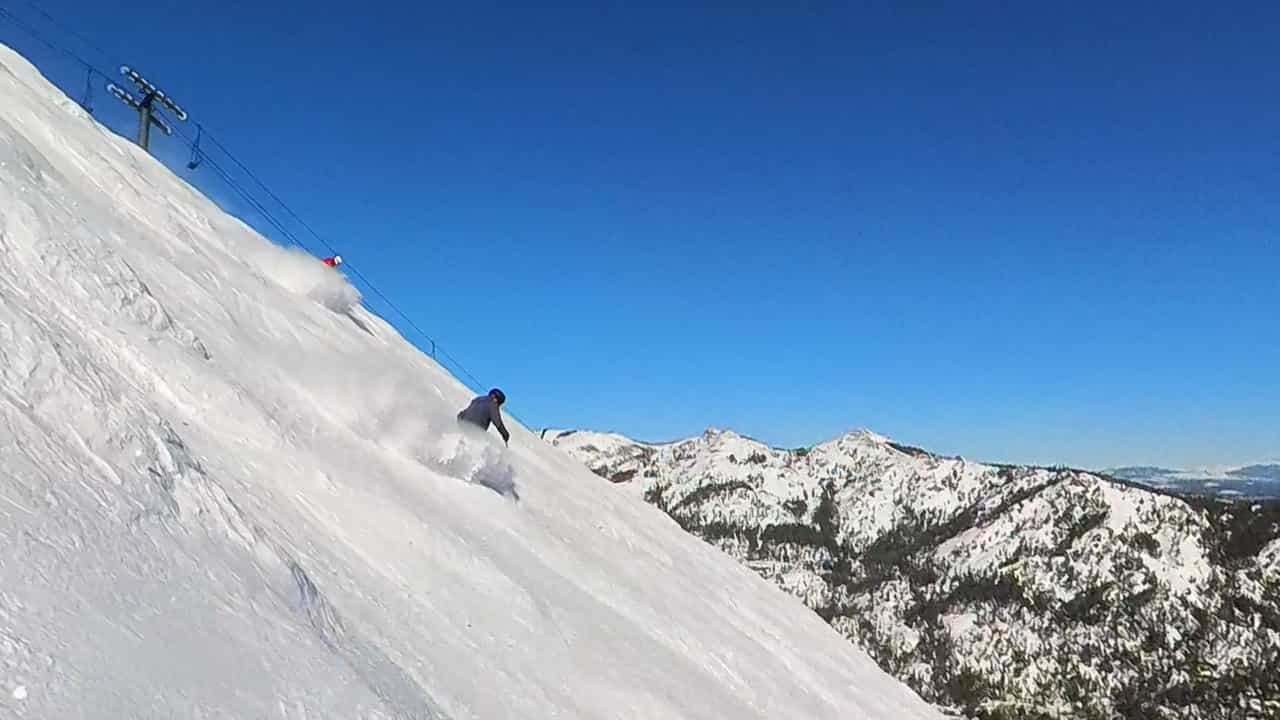 Skier in fresh snow on East Face