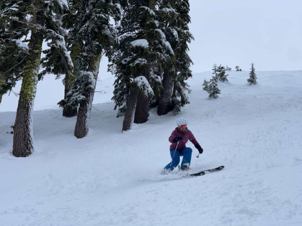 skier in fresh snow on The Nose