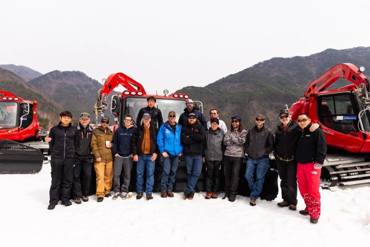 Craig Patterson and Andy Lindsey with the grooming crew in Korea.