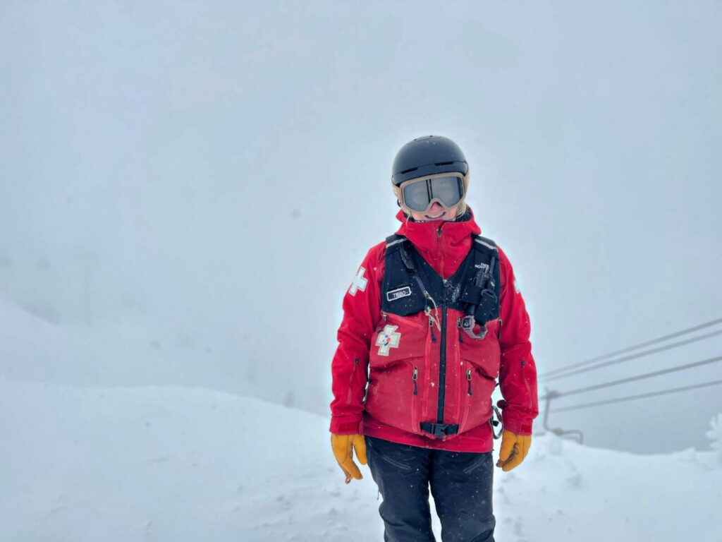 Ski Patroller Jaime Tibbo at the top of KT-22.