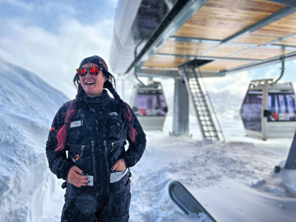 Angie Hong standing in front of the Gondola's top terminal