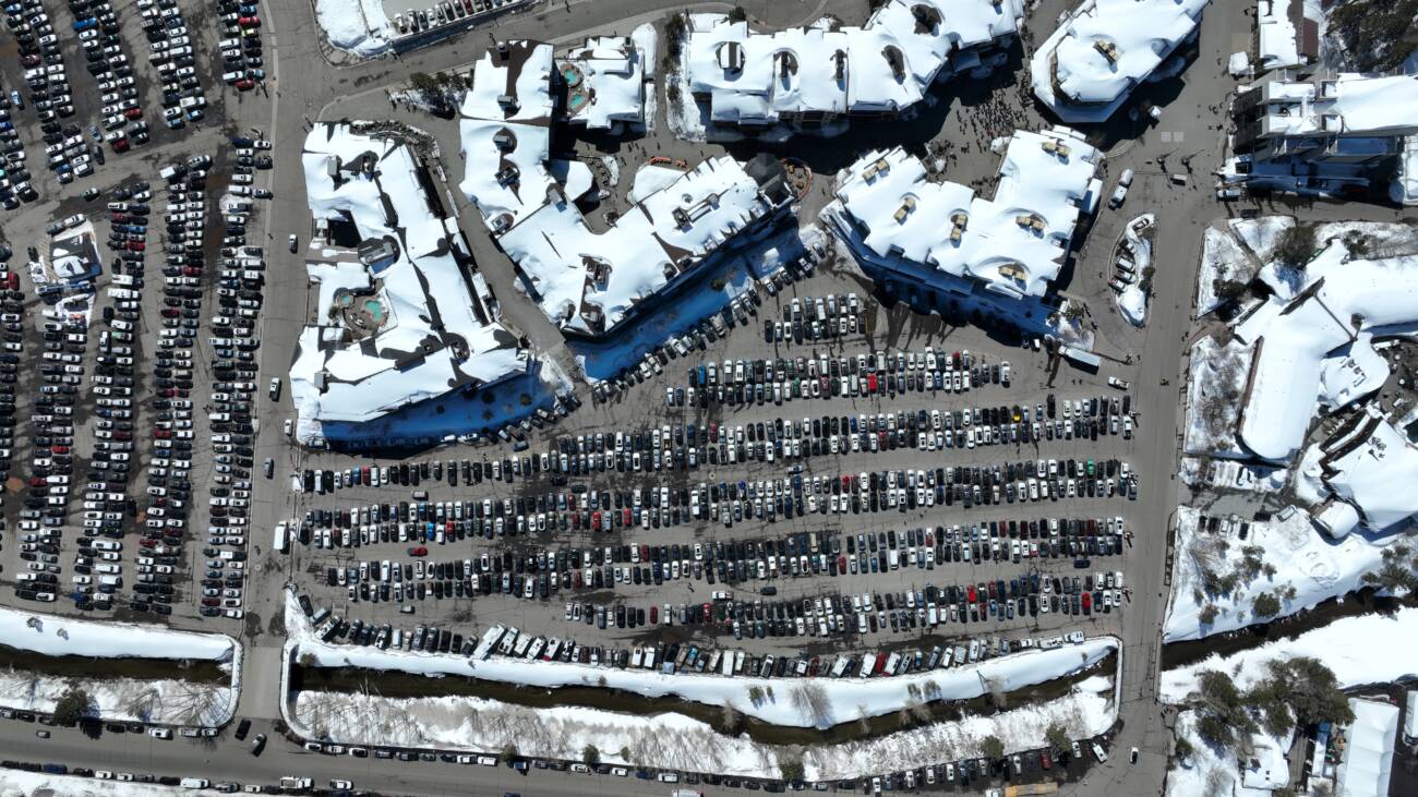 A view of a parking lot at Palisades Tahoe from above.