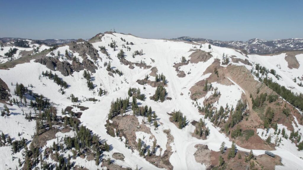 A drone shot of the snowpack at Alpine in June.