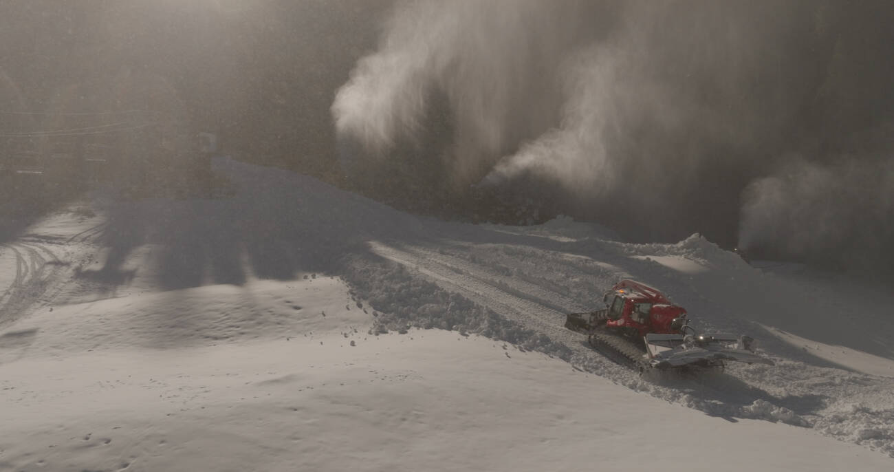 A snowcat operating during snowmaking on First ventures