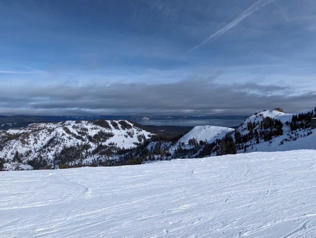 View of Lake Tahoe from snowy mountain at Palisades Tahoe california
