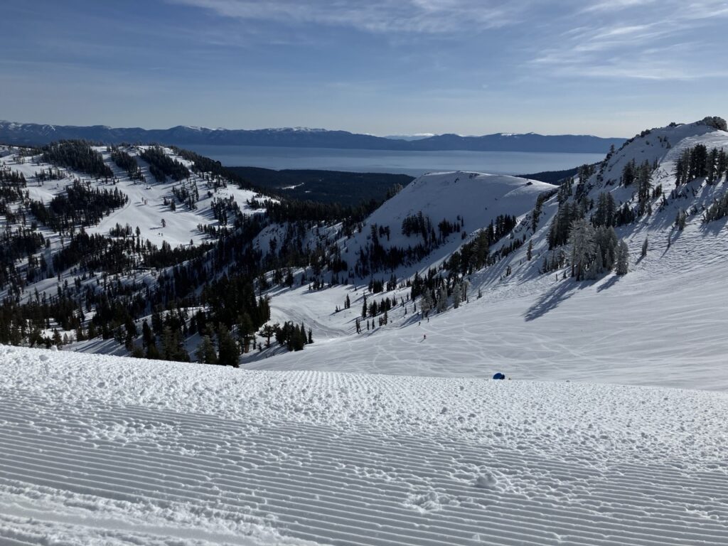 View of Lake Tahoe from top of snow ski slope