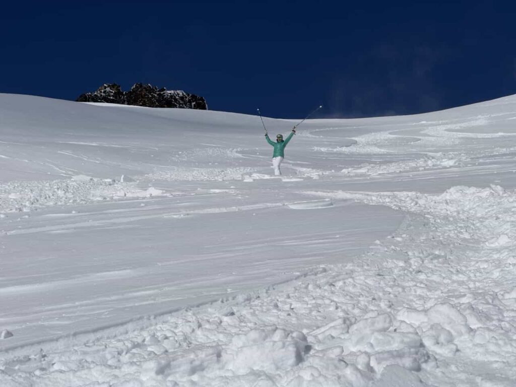 skier on mountain in deep snow