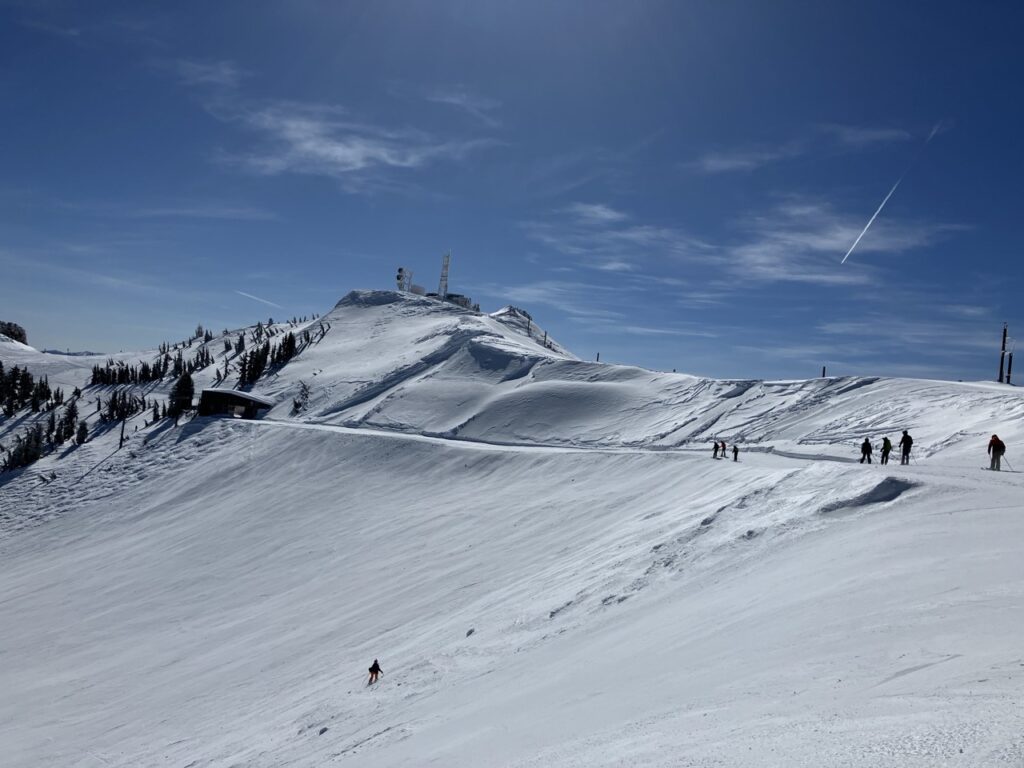 snowy mountain at ski resort and blue sky