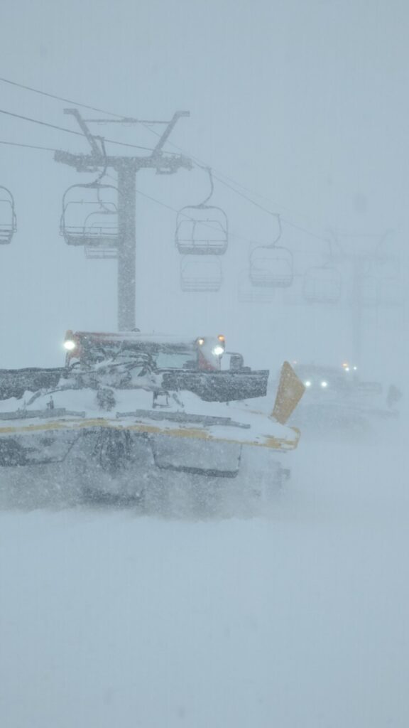 A snowcat in very low visibility