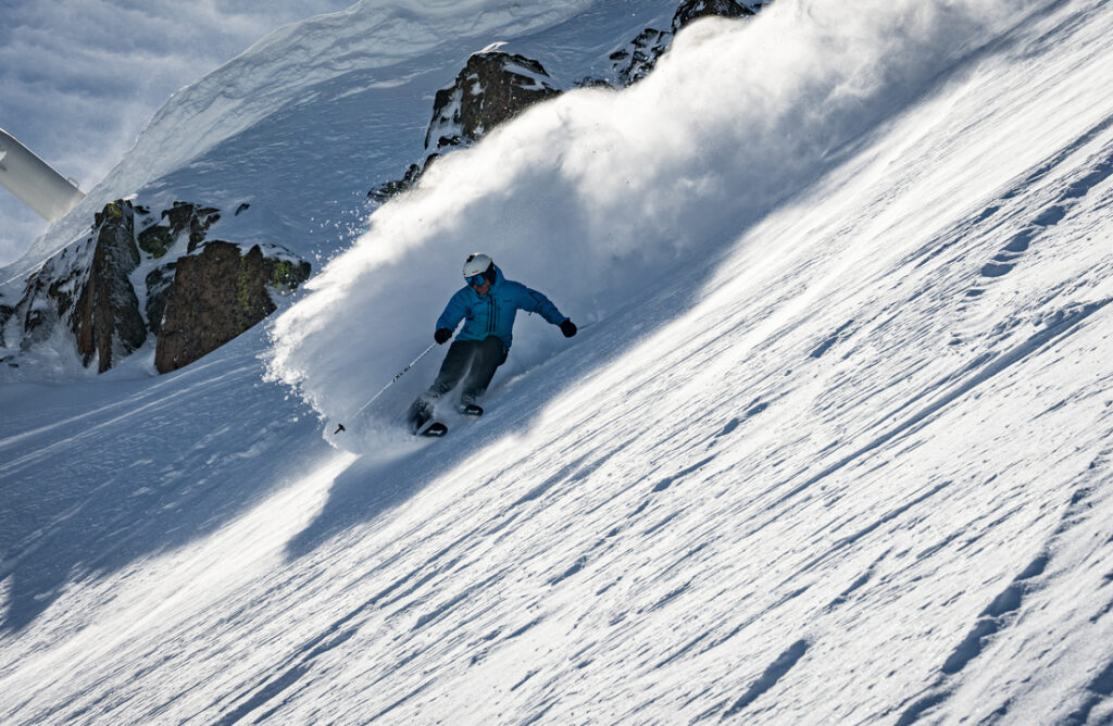 JT Holmes carving in a shoot for Warren Miller.