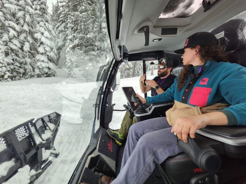 Allison Brown, Palisades Grooming, in a snowcat.