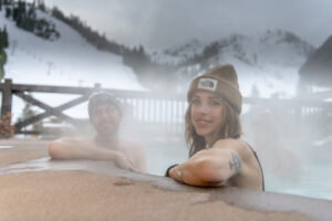 Couple enjoying the hot tubs in The Village at Palisades Tahoe