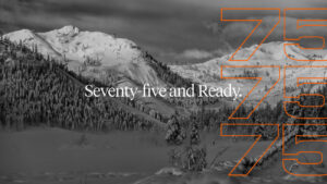 Scenic view of Olympic Valley with the text "Seventy-five And Ready." to signify 75 years at Palisades Tahoe