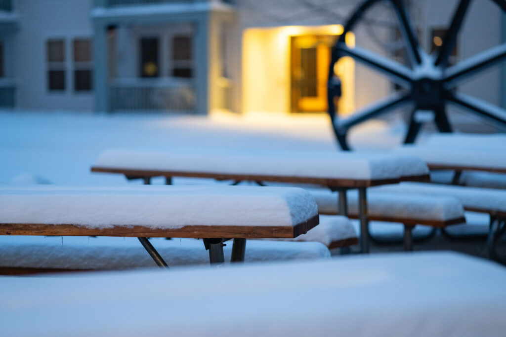 snow on picnic tables