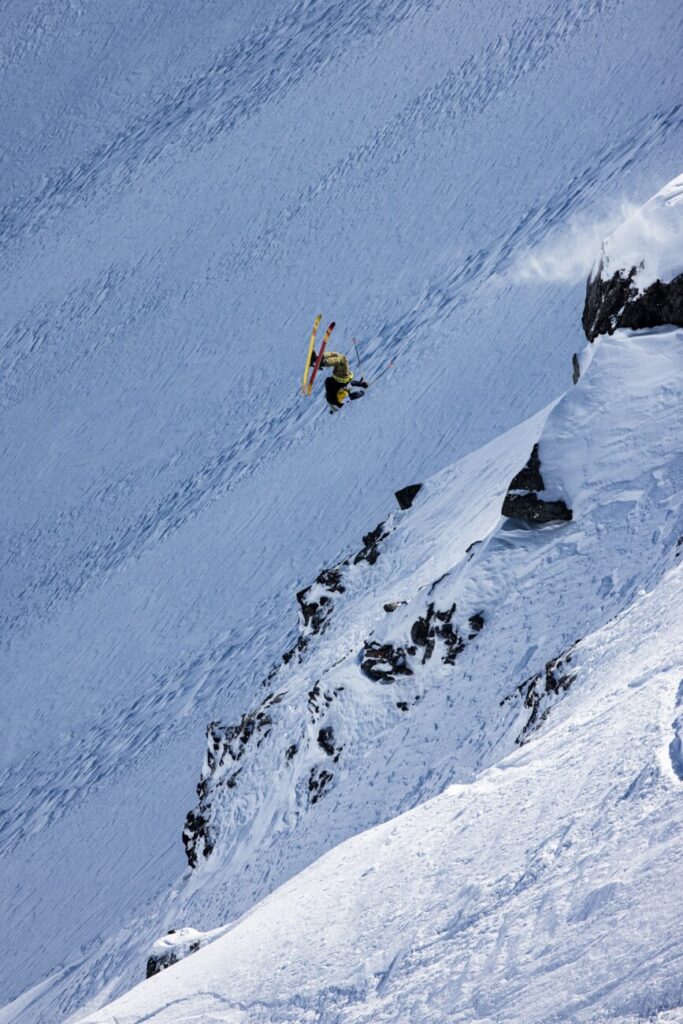 Ross Tester hitting a backflip off of a cliff.