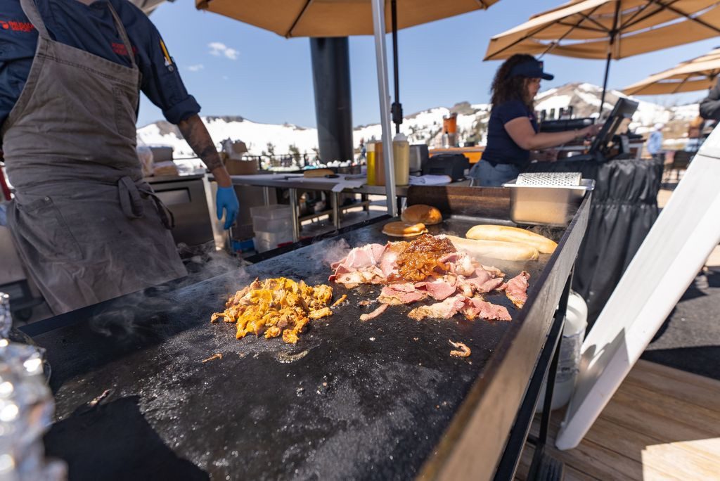 Grilling meat at High Camp BBQ