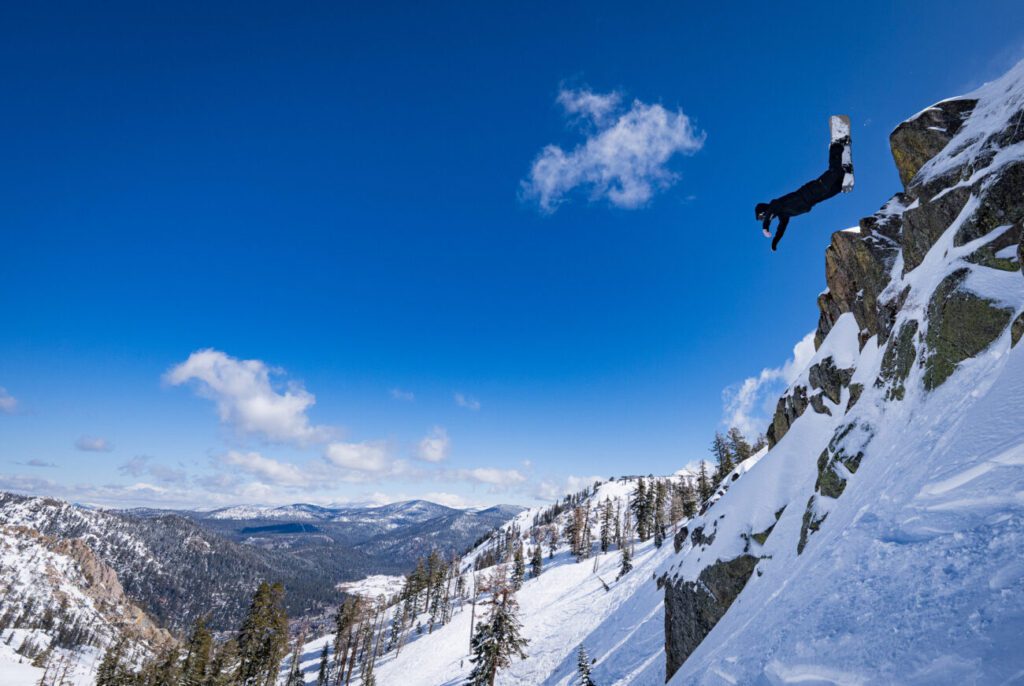 Cass Jones sending a backflip off Granite Chief