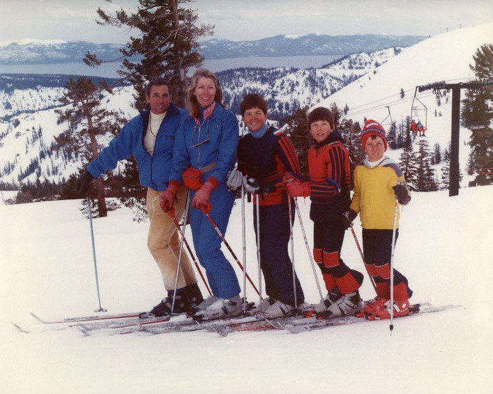 The Moseley family, with sons Jeff, Rick, and Jonny in the 80s at Palisades Tahoe with a view of Lake Tahoe