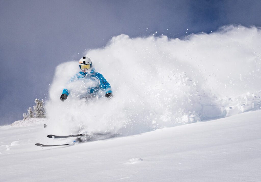 JT Holmes skiing pow at Palisades Tahoe