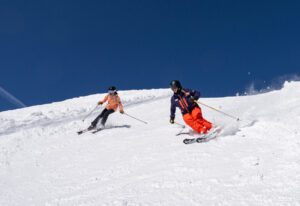 Skier with Mountain Sports School instructor