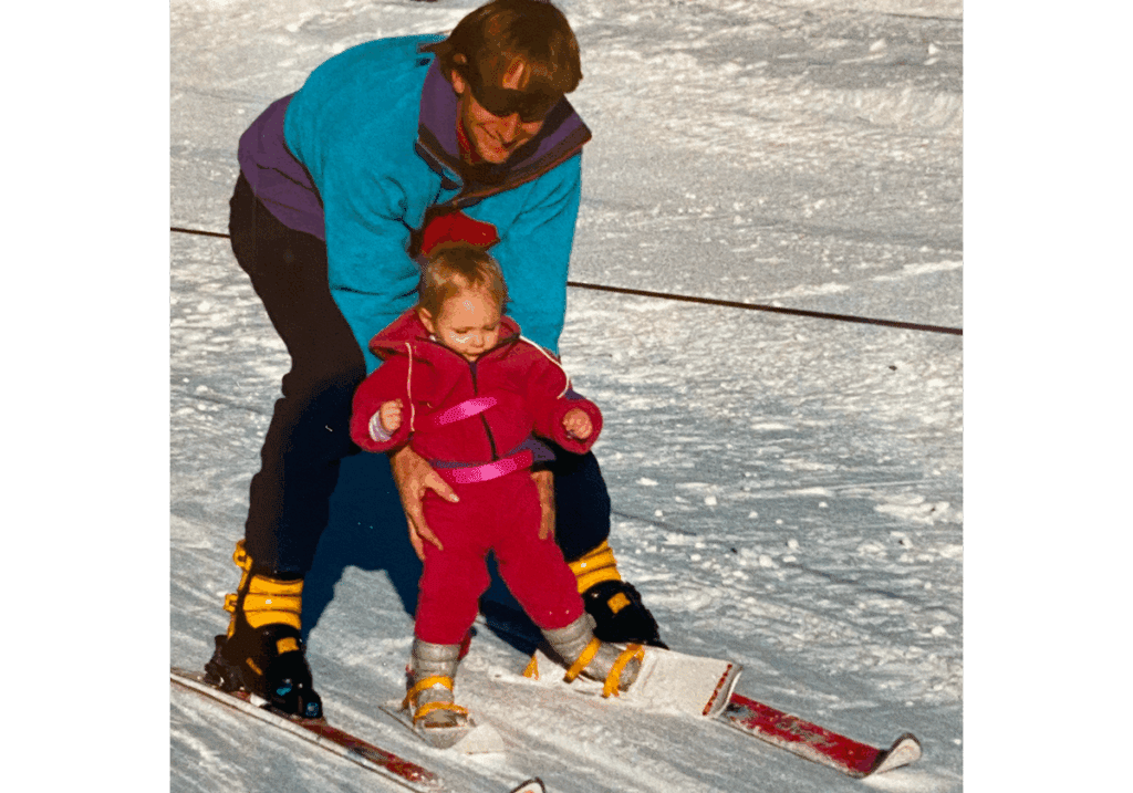 Amie as a baby with her dad