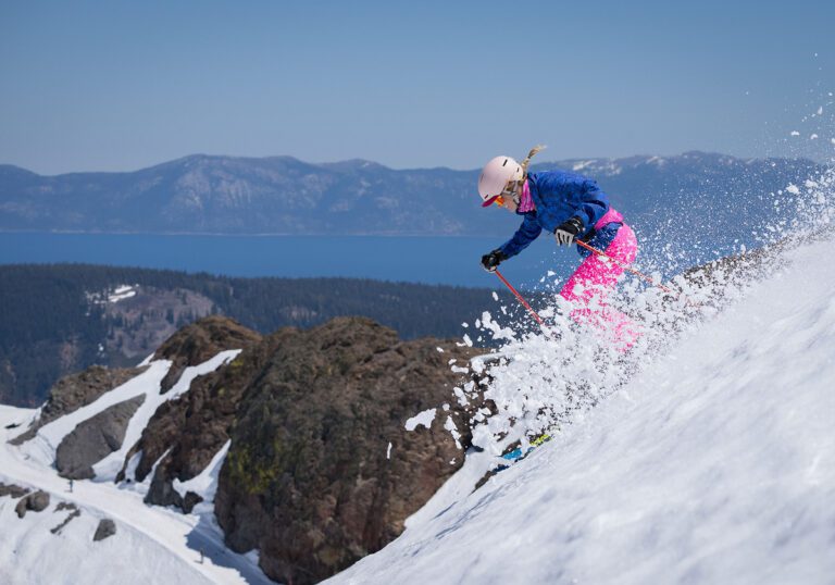Amie rocking a color coordinated outfit as a kid and as a professional skier