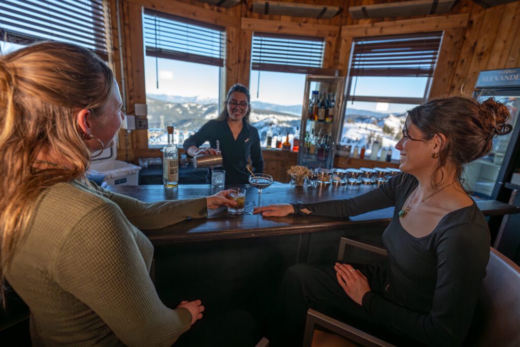 two women getting drinks at Alexanders