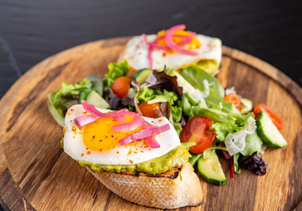 Avocado toast with egg at Rocker